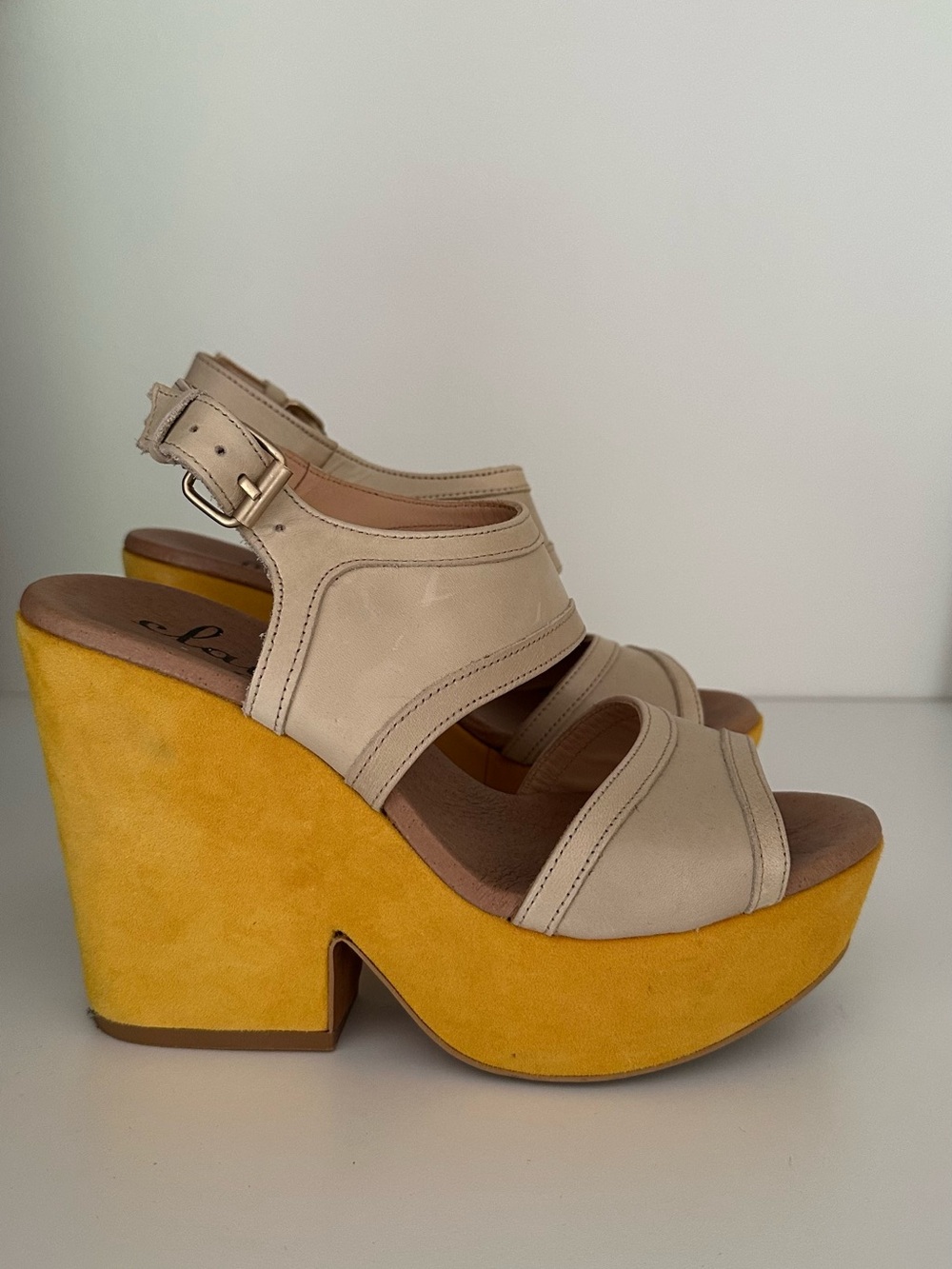 yellow and beige wedge heels